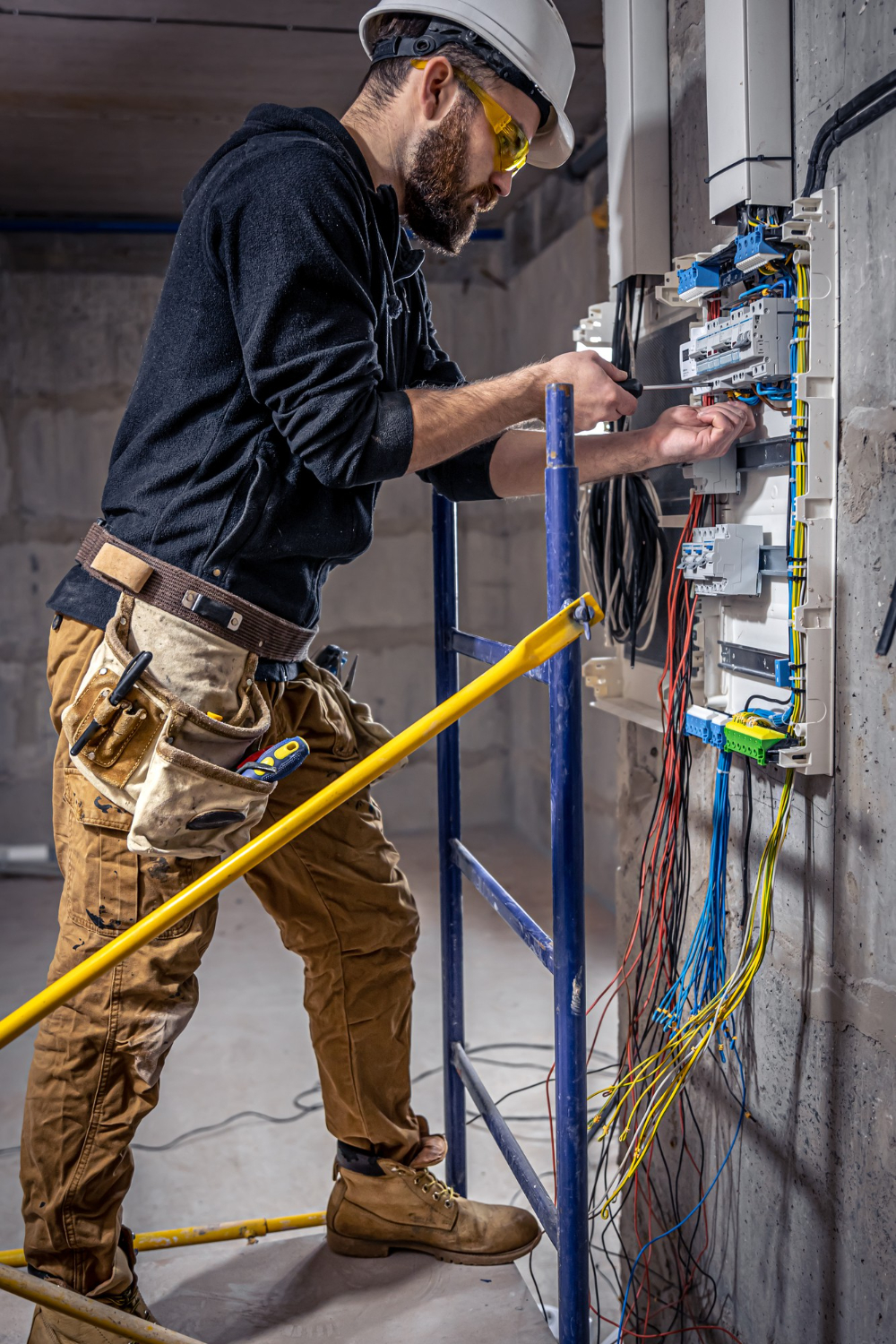 electrician installing equipment mobmed specialty projects medical services